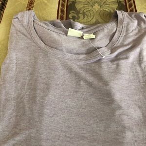 Women’s St Tropez West purple top. Shortsleeved